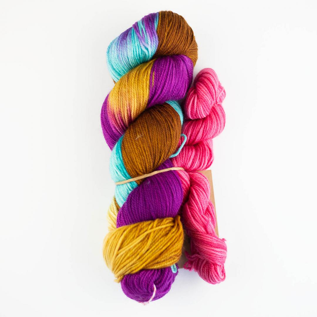 Sockenwolle manos del Uruguay Braun gelb pink lila